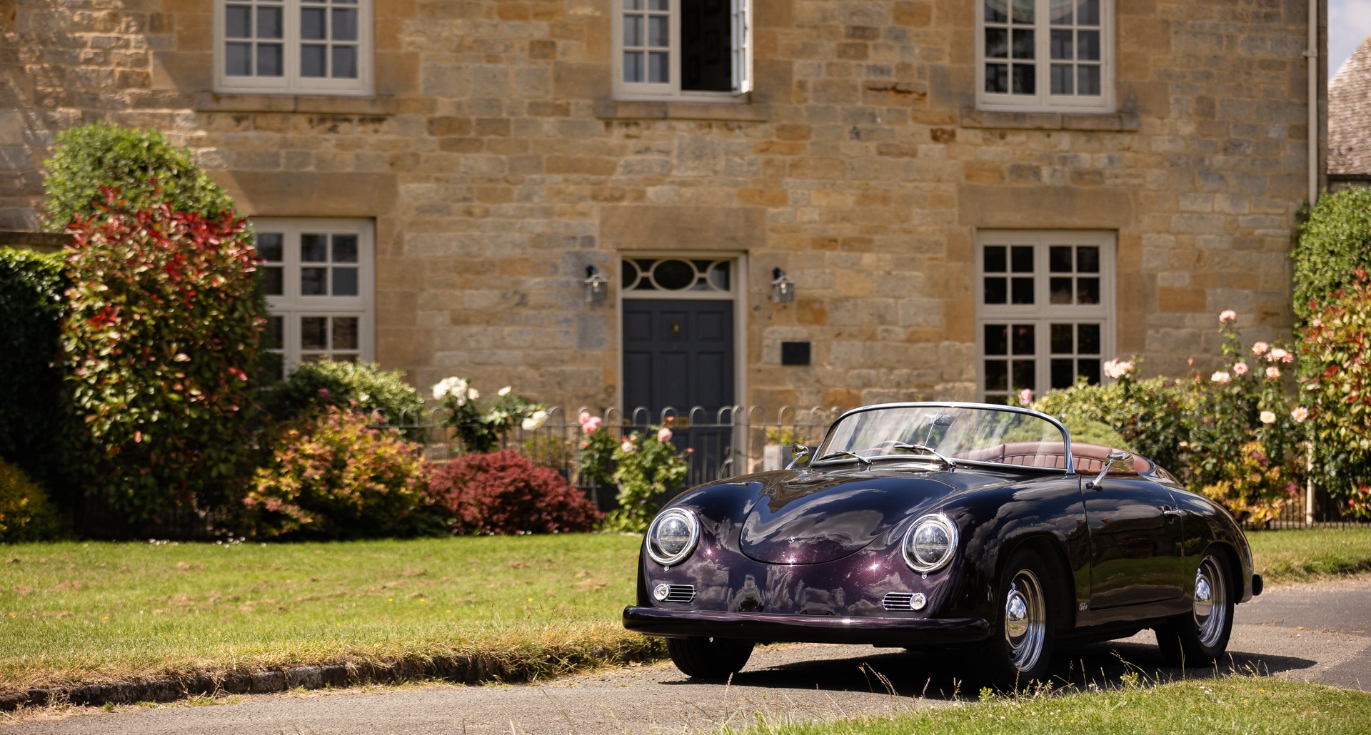 Sebring Speedster outside a Cotswold stone house
